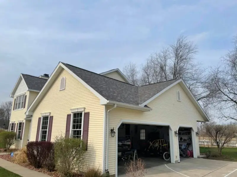 Completed asphalt shingle roof replacement with Owens Corning Duration shingles in colonial slate on a home in Shipshewana, LaGrange County, Indiana.
