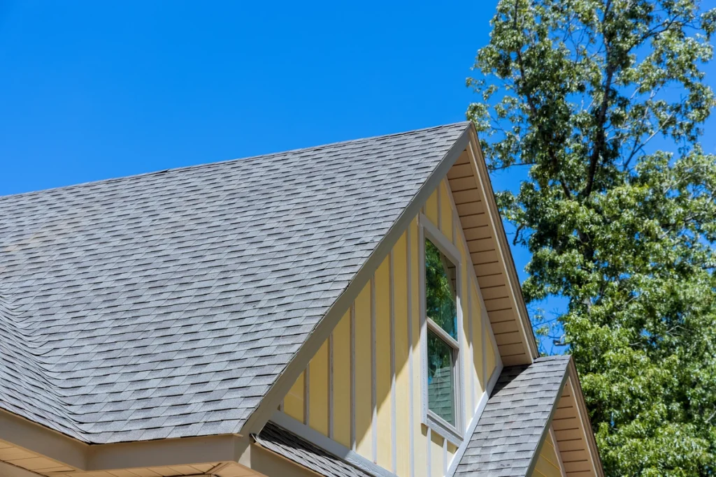 roof asphalt shingles yellow siding