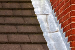 roof flashing-step flashing between roofing and brick wall