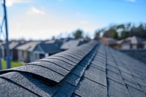roof ridge-close up of roof ridge on a shingle roof
